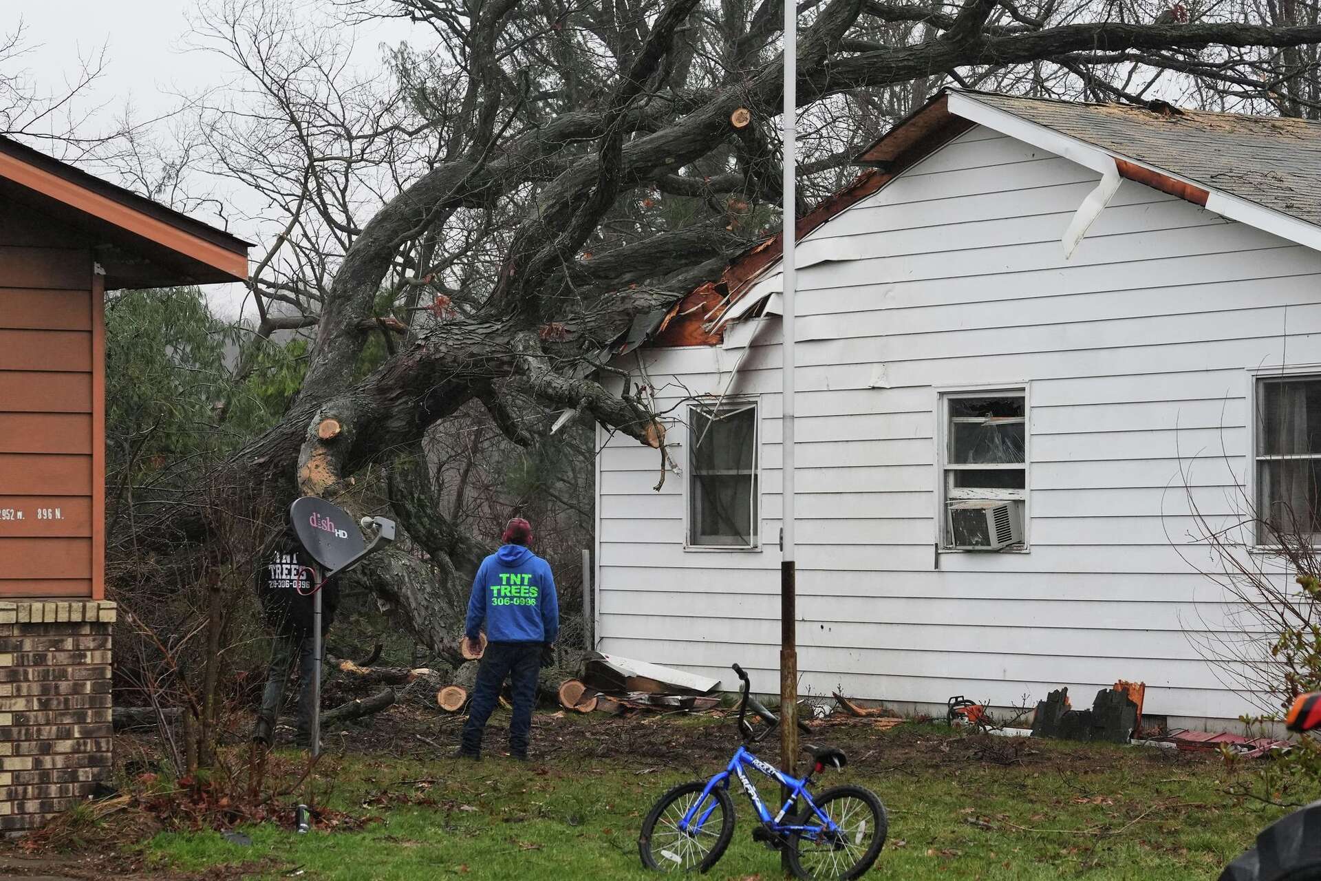 Photos show tornado damage after powerful storms hit Illinois and Indiana