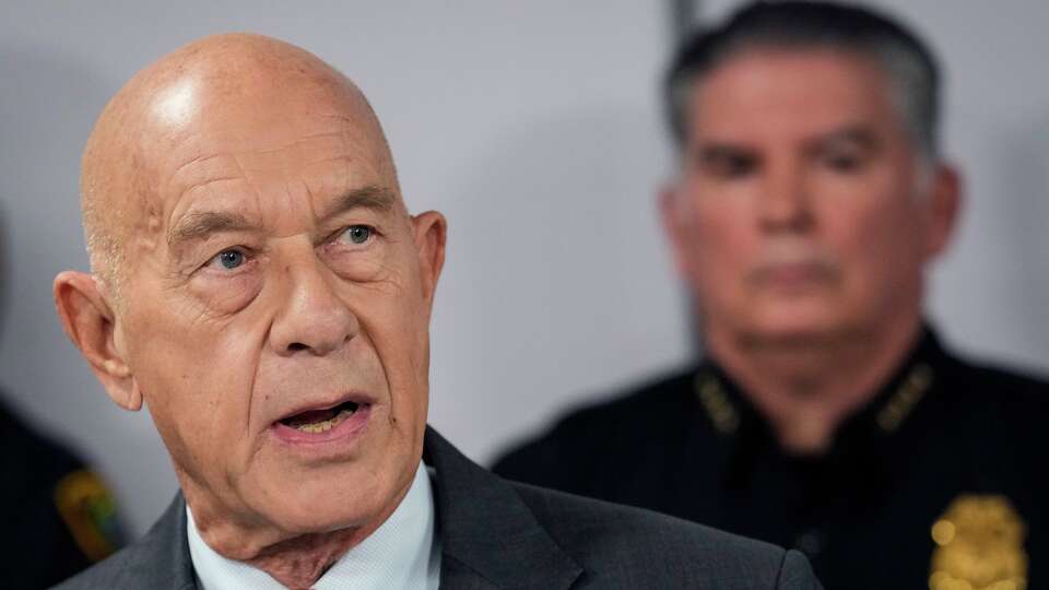Mayor John Whitmire and Houston Police Chief Noe Diaz speak to the media about the city’s immigration policies, after reports that at least two officers violated policies by transporting people to ICE, during a news conference at HPD headquarters in Houston, Wednesday, March 11, 2026.