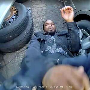 Officer having 'anxiety attack' took ambulance sent for man dying from police shooting, report says