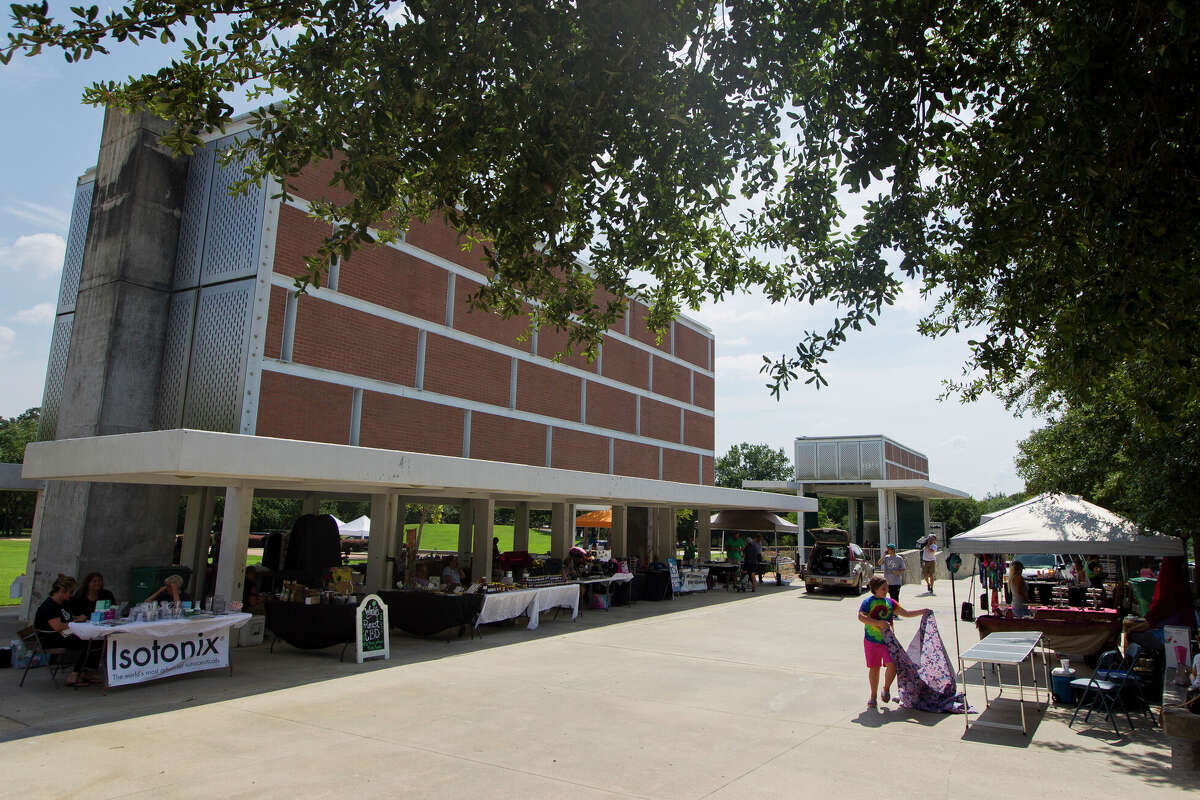 Venders set up for the monthly Isaac Conroe Farmers Market at Heritage Place Park, Thursday, July 11, 2019, in Conroe. The market, which comes together on the first Thursday of the month March through October, ran from 4 p.m. – 8 p.m. prior to the city's Free First Thursday Concert Series, which featured Derek Spence and Southern County Line with a tribute to country music singer George Strait. Upcoming concerts in the series are on Aug. 1 with Randall King and Sept. 5 with Escape – a Journey tribute. Concerts are from 7 to 9 p.m., so bring your chairs and blankets and get comfortable. Outside alcohol is not permitted. Beer and concessions available onsite, while aater, soda, and food may be brought in. For more information call 936-522-3900.