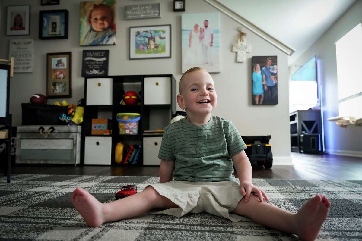 Tucker McClintock, a 2-year old kidney transplant recipient, poses for a portrait in the playroom at his family's home in Spring, Wednesday, March 11, 2026.