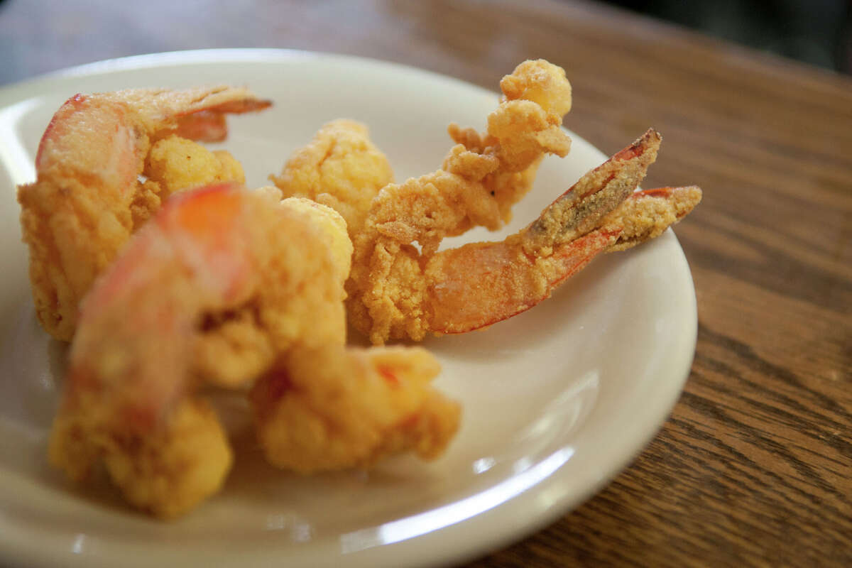Freshly fried, locally caught shrimp wait to be taken to a customer at Sarah's Restaurant in Grand Isle, Louisiana on March 9, 2011. A recent NOAA study revealed the U.S. Gulf Coast shrimping industry is in decline, with revenues diving more than $200 million from the year prior.