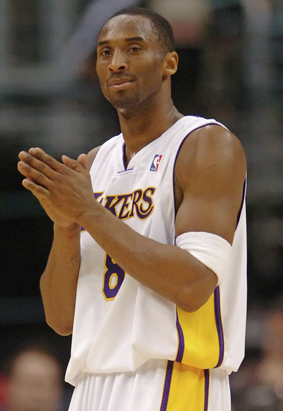 Los Angeles Lakers' Kobe Bryant reacts during the second half of the NBA basketball game against the Toronto Raptors Sunday, Jan. 22, 2006, in Los Angeles. Bryant scored 81 points in the game, the second highest in NBA history, as the Lakers beat the Raptors 122-104. (AP Photo/Matt Brown)