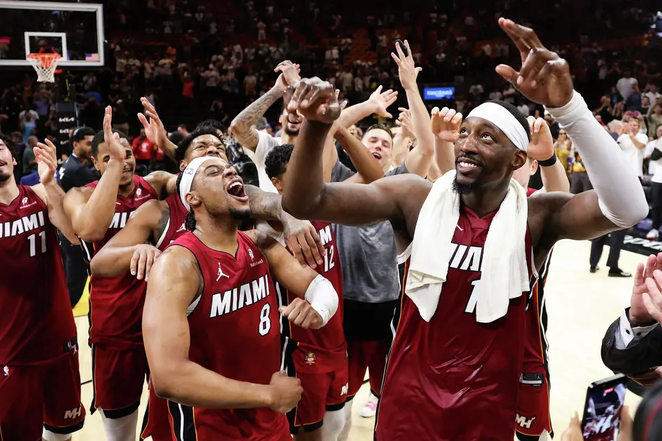The Miami Heat's Bam Adebayo (13) celebrates with teammates after a 150-129 win against the Washington Wizards at Kaseya Center on Tuesday, March 10, 2026, in Miami. Adebayo passed Kobe Bryant for the second-most points scored in an NBA game with 83. (Megan Briggs/Getty Images/TNS)