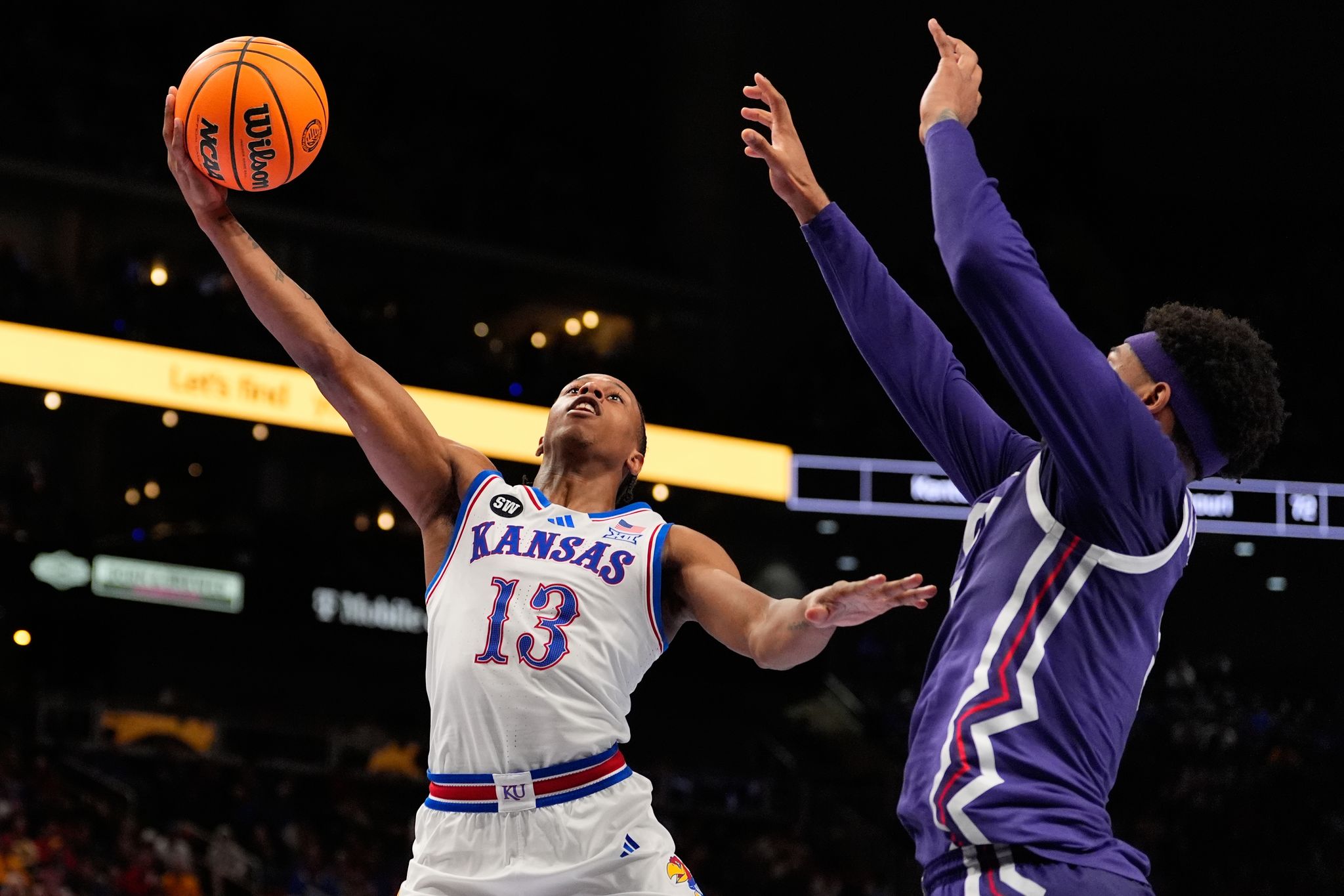 Peterson scores 24 to lead No. 14 Kansas past TCU 78-73 in the Big 12 ...