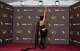 FILE - Teyana Taylor poses in the press room with the award for best performance by a female actor in a supporting role in any motion picture for "One Battle After Another" during the 83rd Golden Globes in Beverly Hills, Calif., on Jan. 11, 2026.