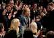 FILE - Amy Madigan, center, reacts to winning the award for best supporting actress for "Weapons" during the 31st Annual Critics Choice Awards in Santa Monica, Calif., on an. 4, 2026.