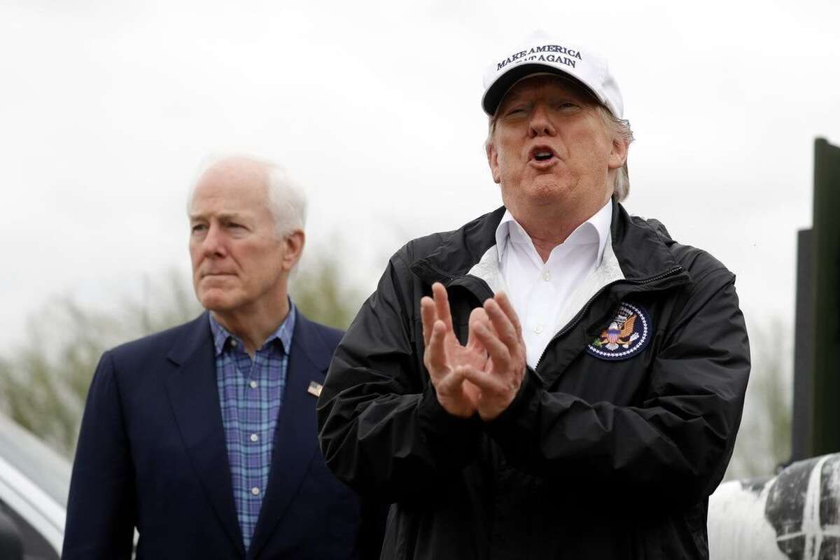 U.S. Sen. John Cornyn, R-Texas, stands with President Donald Trump during a 2019 visit to McAllen.