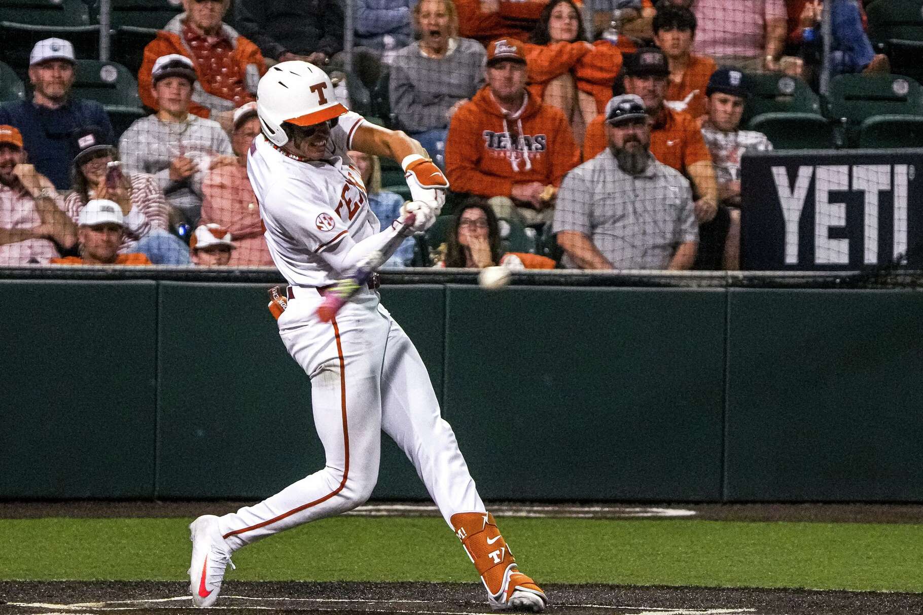Texas Longhorns infielder Adrian Rodriguez (24) hits a pitch during the game against Ole Miss at UFCU Disch-Falk Field on Friday, March 13, 2026 in Austin.