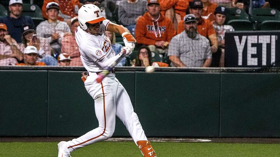 Texas Longhorns infielder Adrian Rodriguez (24) hits a pitch during the game against Ole Miss at UFCU Disch-Falk Field on Friday, March 13, 2026 in Austin.