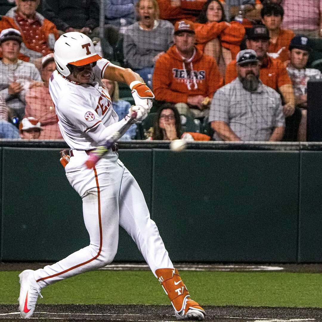 Texas Longhorns infielder Adrian Rodriguez (24) hits a pitch during the game against Ole Miss at UFCU Disch-Falk Field on Friday, March 13, 2026 in Austin.