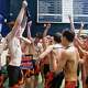 Greenwich swimmers celebrate their team win during the  during the State Open boys swim championships Saturday, March 14, 2026 at Yale's Kiphuth Exhibition pool in New Haven.