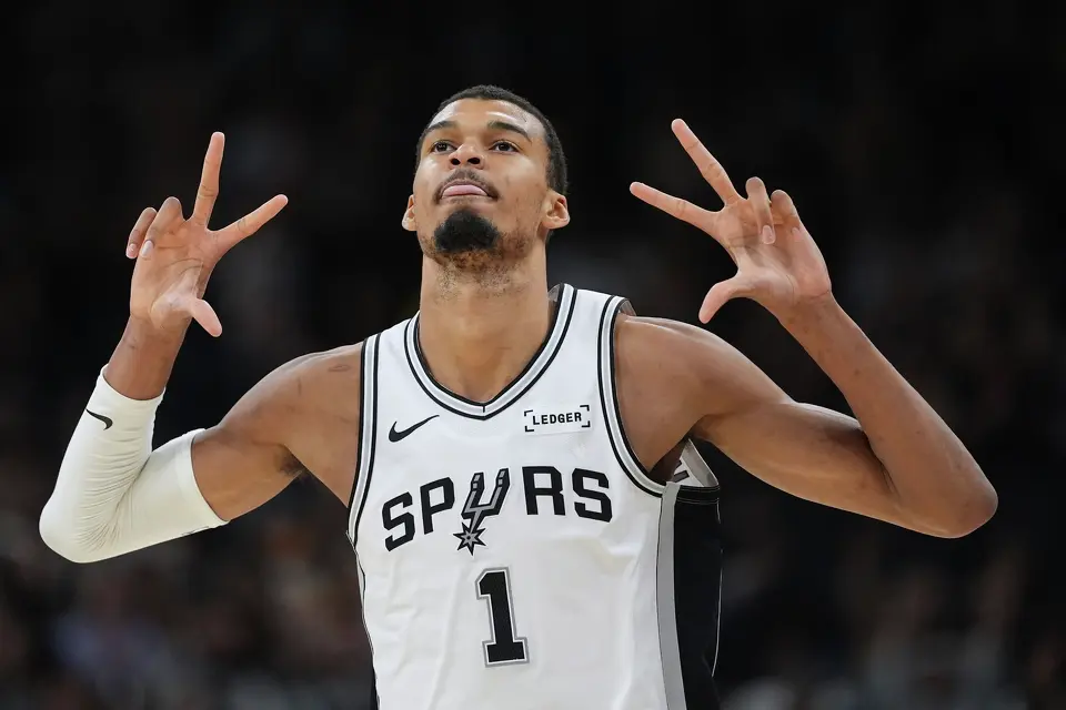 San Antonio Spurs forward Victor Wembanyama (1) celebrates a score against the Charlotte Hornets during the second half of an NBA basketball game in San Antonio, Saturday, March 14, 2026. (AP Photo/Eric Gay)