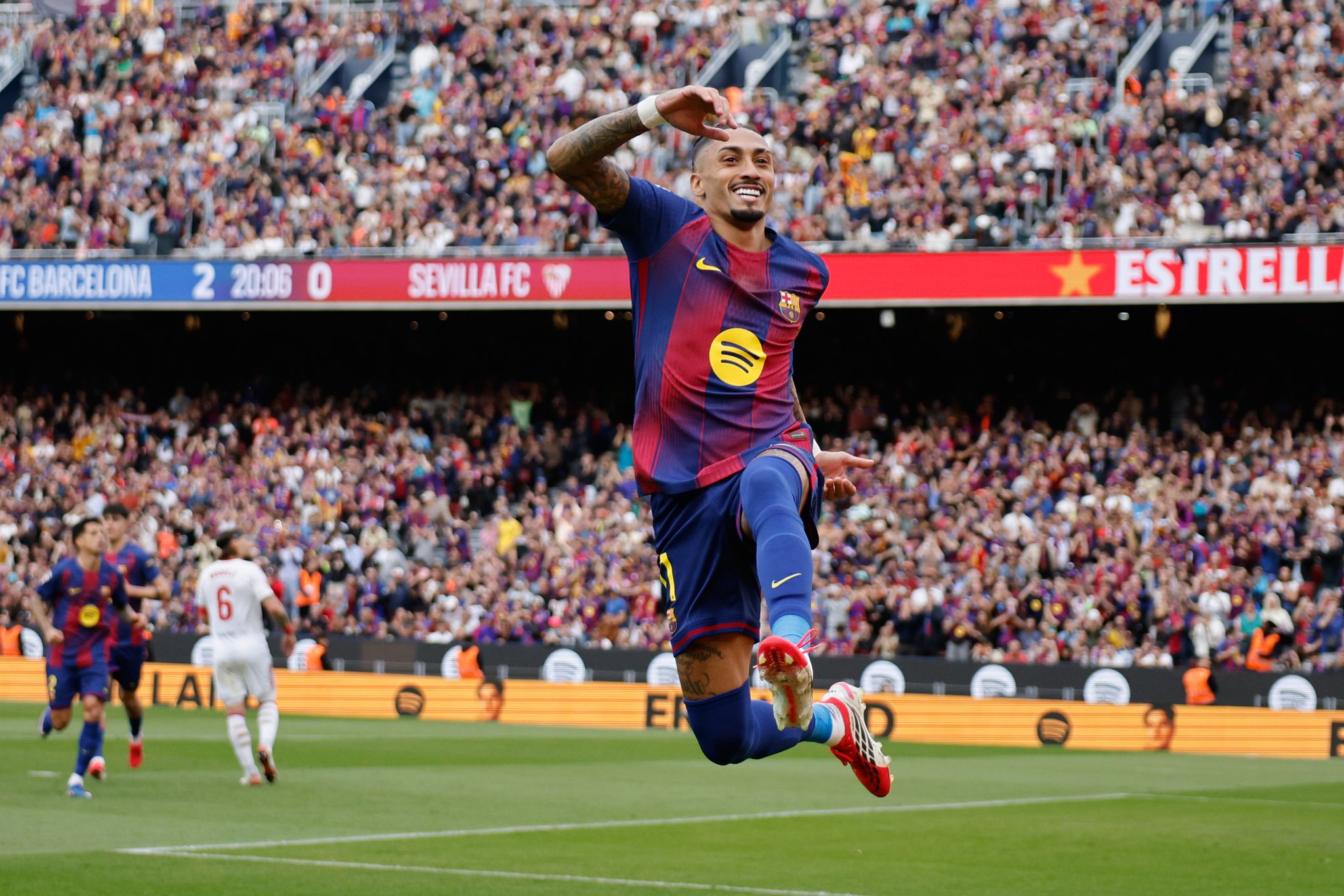 Hat trick for Raphinha as Barcelona beats Sevilla 5-2 to stay 4 points ...