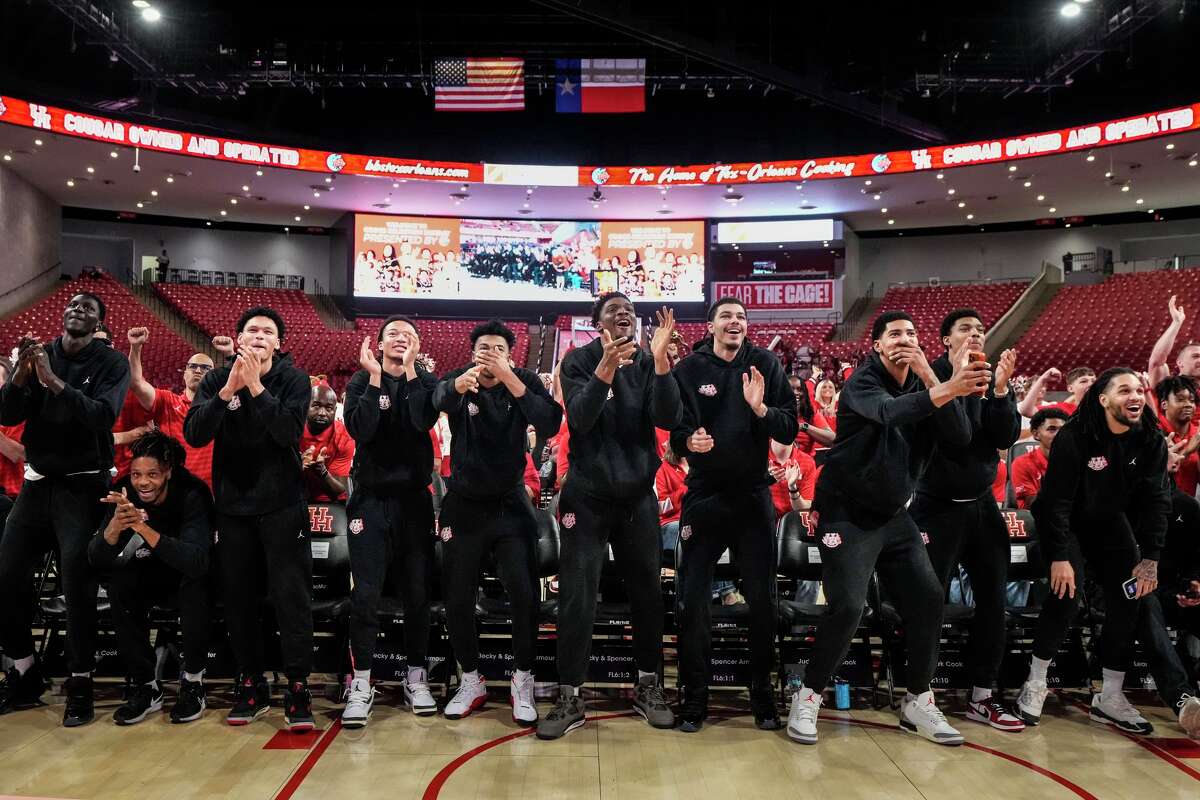 The University of Houston men's basketball team reacts to being named as a No. 2 seed in the South Region during NCAA Selection Sunday at Fertitta Center in Houston, Sunday, March 15, 2026. The Cougars open the tournament against No 15-seed Idaho in Oklahoma City.