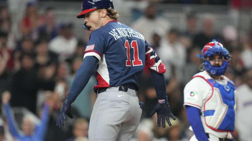 United States' Gunnar Henderson (11) celebrates after hitting a home run during the fourth inning of a World Baseball Classic semifinal game against the Dominican Republic, Sunday, March 15, 2026, in Miami.