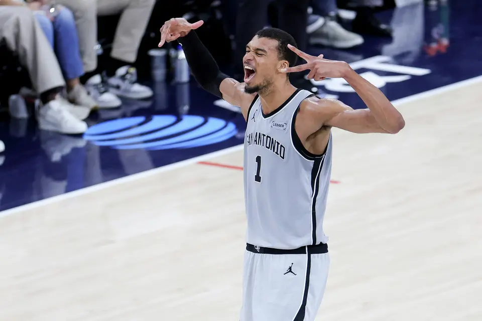 San Antonio Spurs forward Victor Wembanyama reacts during the second half of an NBA basketball game against the Los Angeles Clippers Monday, March 16, 2026, in Inglewood, Calif. (AP Photo/Ryan Sun)