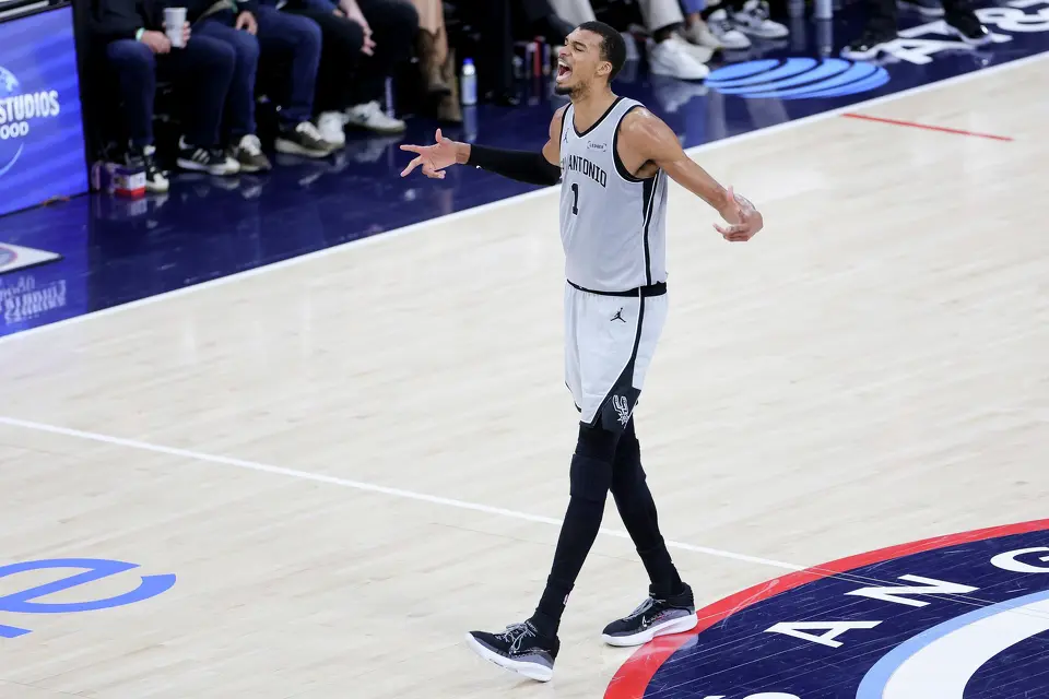 San Antonio Spurs forward Victor Wembanyama reacts during the first half of an NBA basketball game against the Los Angeles Clippers Monday, March 16, 2026, in Inglewood, Calif. (AP Photo/Ryan Sun)