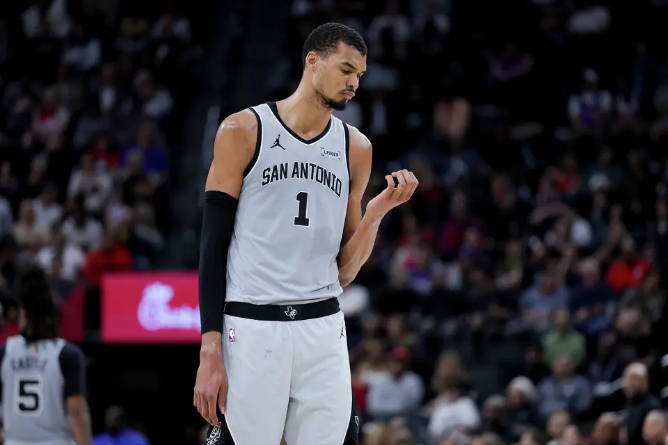 San Antonio Spurs forward Victor Wembanyama reacts during the second half of an NBA basketball game against the Los Angeles Clippers Monday, March 16, 2026, in Inglewood, Calif. (AP Photo/Ryan Sun)