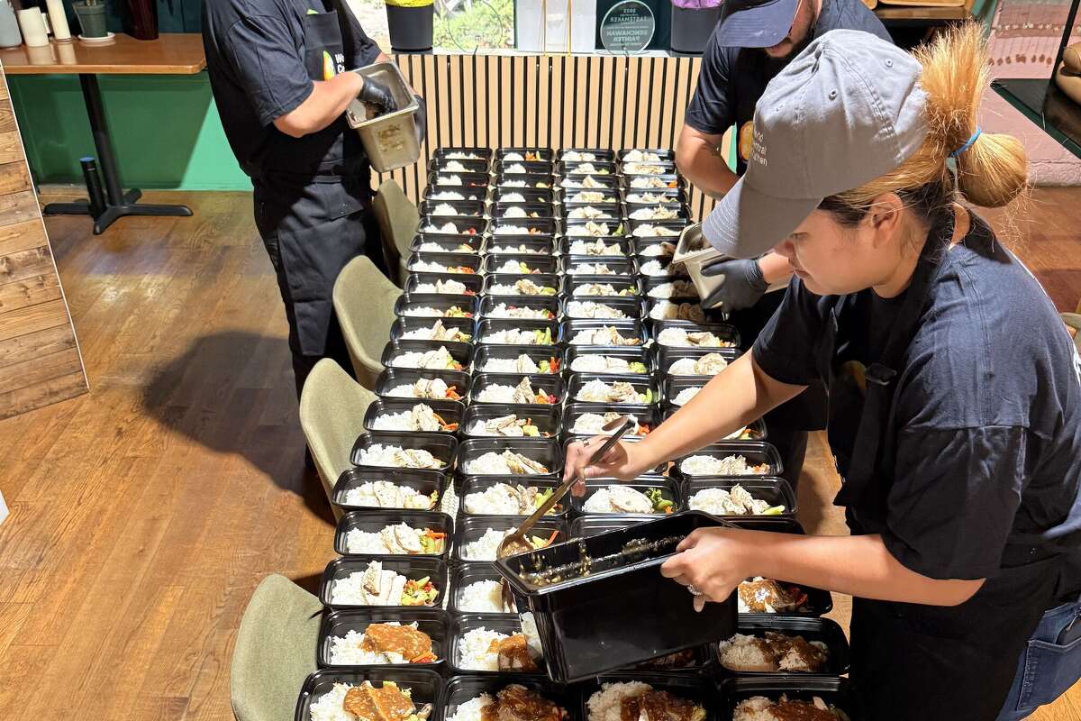 Chef Benchawan Painter preparing meals for TSA agents at Houston airports, with the help of World Central Kitchen.
