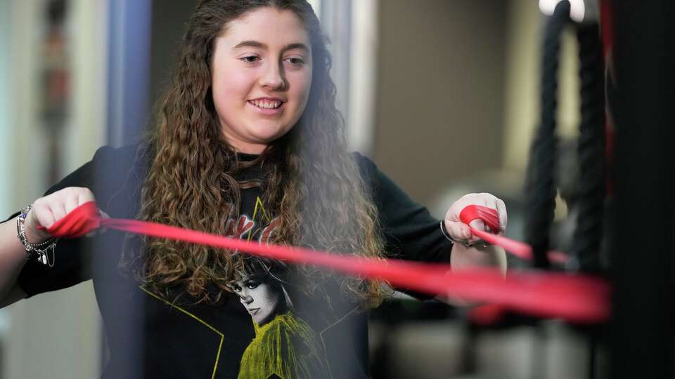 Myra Fennell, 16, is shown at Spring Physical Therapy in Spring Wednesday, March 18, 2026. Doctors at Memorial Hermann eventually discovered Myra had spinal arachnoid webs, a rare condition.