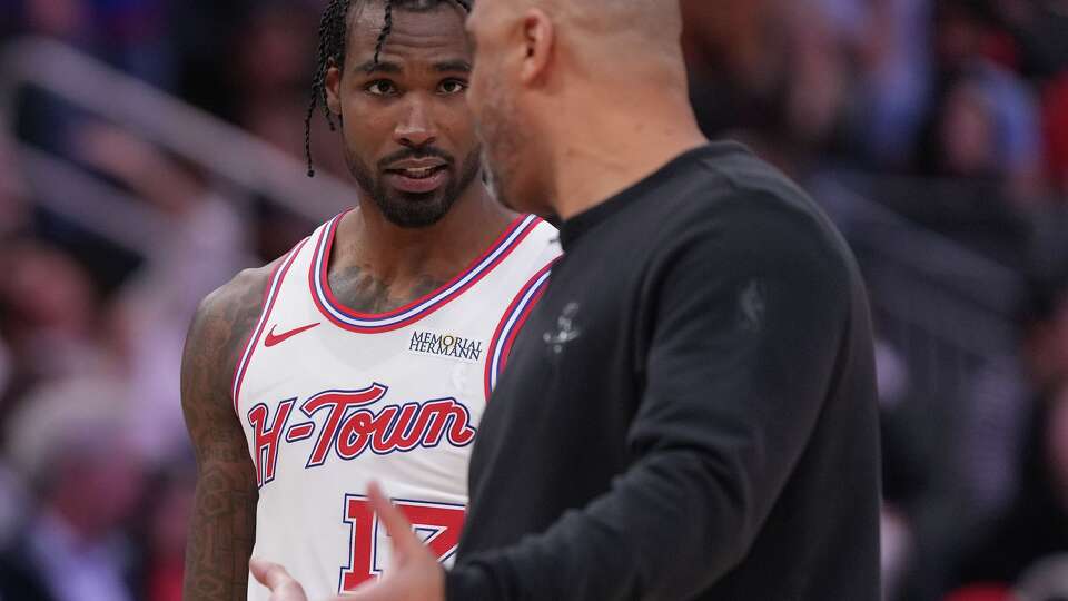 Houston Rockets head coach Ime Udoka talks with forward Tari Eason (17) as the team takes on the Los Angeles Lakers at the Toyota Center in Houston on Wednesday, March 18, 2026.
