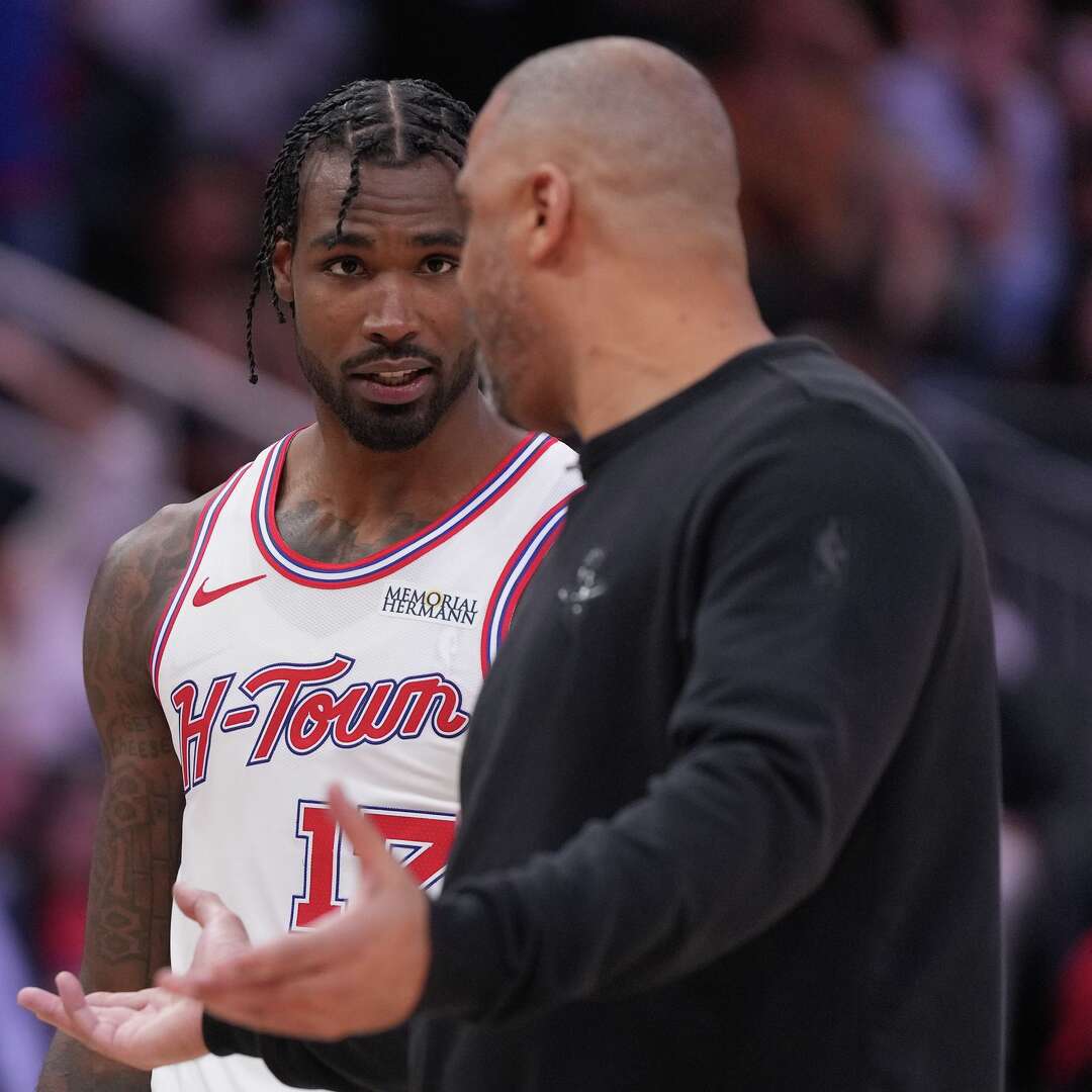 Houston Rockets head coach Ime Udoka talks with forward Tari Eason (17) as the team takes on the Los Angeles Lakers at the Toyota Center in Houston on Wednesday, March 18, 2026.