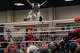 Tokyo Joshi Pro Wrestler Rika Tatsumi jumps from the top rope as she is introduced in the all-female Texas Stampede showcase during South by Southwest in Austin, Wednesday, March 18, 2026. Joshi Pro Wrestling blends WWE-style combat entertainment and Japanese pop idol culture into wrestling performances.