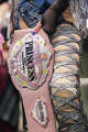 A wrestler holds a championship belt as Tokyo Joshi Pro Wrestlers compete in the all-female Texas Stampede showcase during South by Southwest in Austin, Wednesday, March 18, 2026. Joshi Pro Wrestling blends WWE-style combat entertainment and Japanese pop idol culture into wrestling performances.