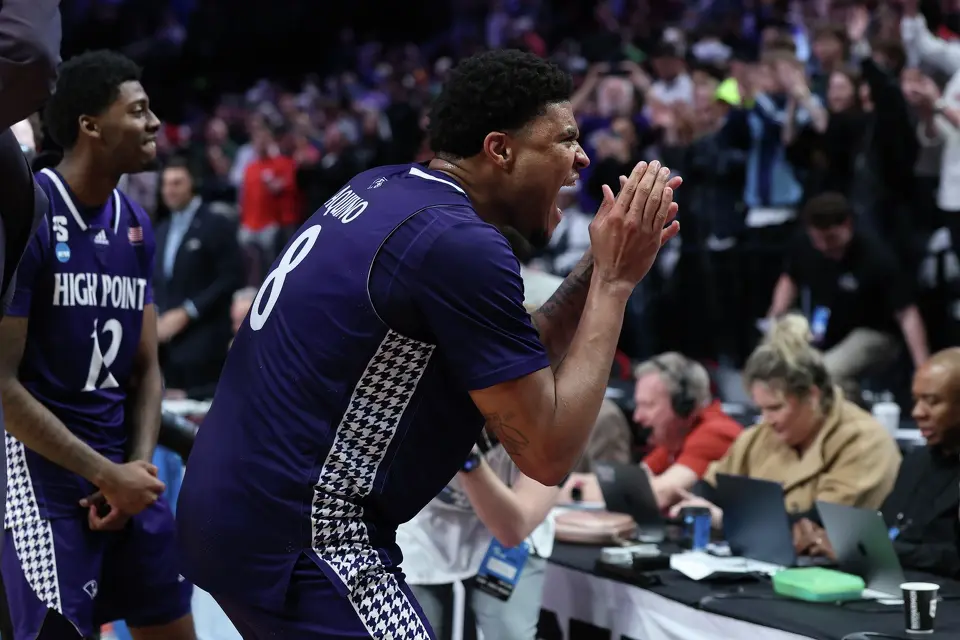 High Point forward Owen Aquino (8) reacts after the first round of the NCAA college basketball tournament against Wisconsin, Thursday, March 19, 2026, in Portland, Ore. (AP Photo/Craig Mitchelldyer)