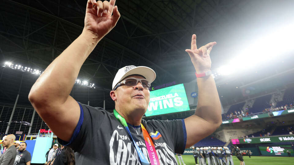 MIAMI, FL - MARCH 17: Manager Omar López #22 of Team Venezuela celebrates after winning the 2026 World Baseball Classic Championship game presented by Capital One between Team Venezuela and Team USA at loanDepot Park on Tuesday, March 17, 2026 in Miami, Florida. 