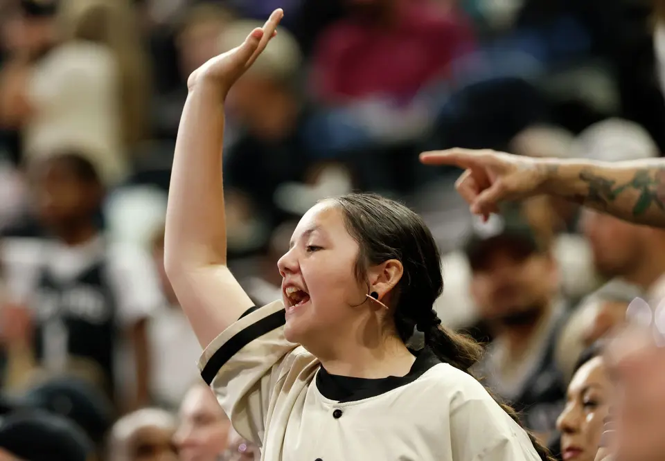 Gabriella De La Rosa cheers at Frost Bank Center in San Antonio, Thursday, March 19, 2026. The Spurs won in the last second, 101-100.