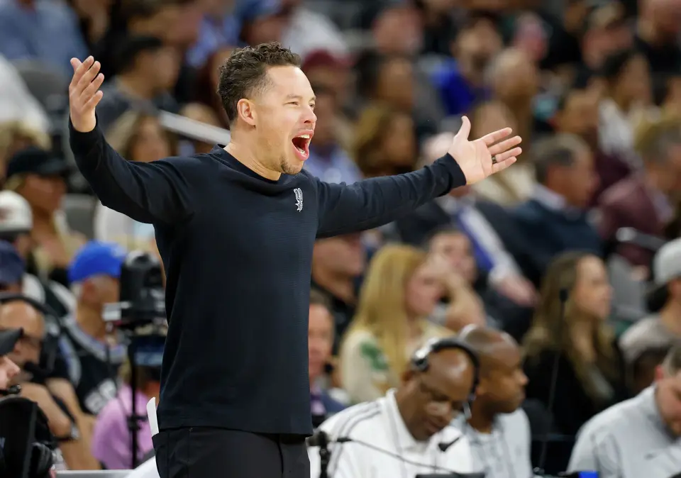 Spurs head coach Mitch Johnson reacts to a foul at Frost Bank Center in San Antonio, Thursday, March 19, 2026. The Spurs won in the last second, 101-100.