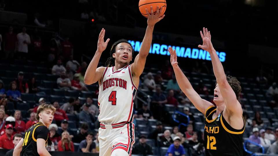 Houston guard Kingston Flemings (4) takes a shot against Idaho forward Jackson Rasmussen (12) during the second half in the first round of the NCAA college basketball tournament in Oklahoma City, Thursday, March 19, 2026.