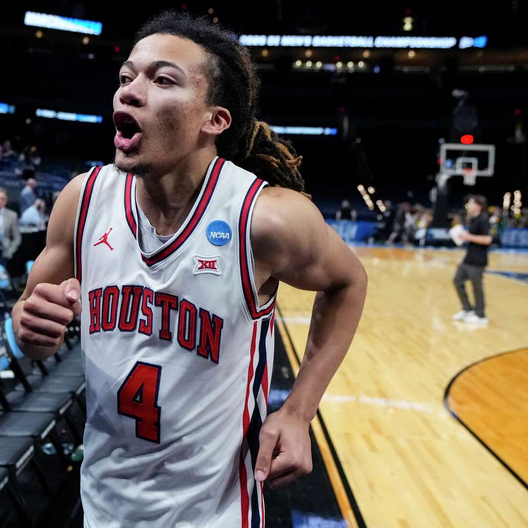 Houston guard Kingston Flemings celebrates as he runs off the court after the Cougars beat Idaho 78-47 during the second half in the first round of the NCAA college basketball tournament in Oklahoma City, Thursday, March 19, 2026.