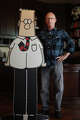 Scott Adams, cartoonist and author and creator of "Dilbert," poses for a portrait with a life-sized Dilbert cutout in his home office on Monday, January 6, 2014 in Pleasanton, Calif. Adams has published a new memoir "How to Fail at Almost Everything and Still Win Big: Kind of the Story of My Life."
