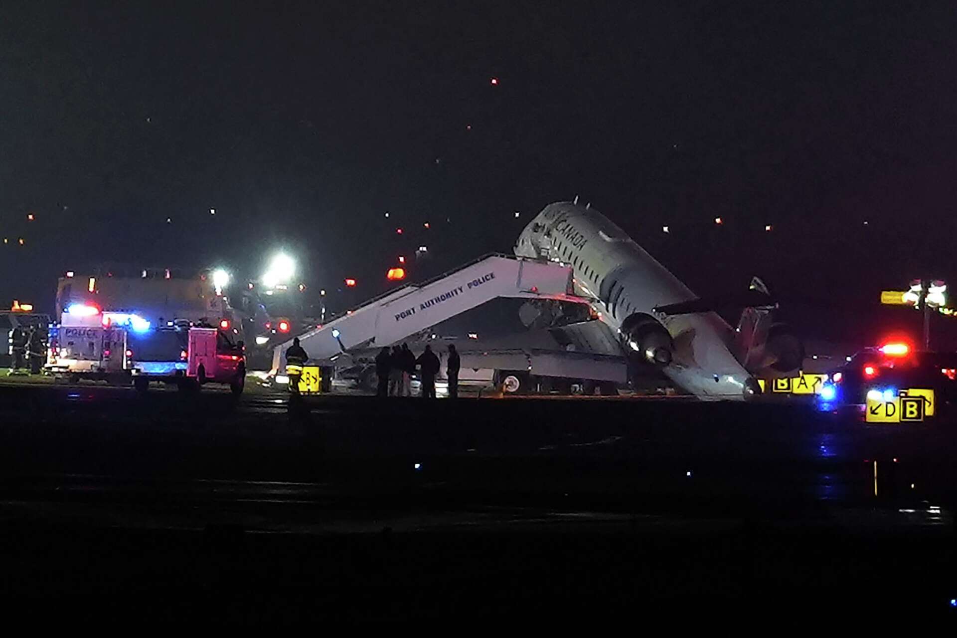 Photos show the scene of a collision on a runway at LaGuardia Airport in  New York