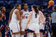 STORRS, CONNECTICUT - MARCH 21: Sarah Strong #21 of the Connecticut Huskies speaks with teammates Blanca Quinonez #4 and Kayleigh Heckel #9 during the first half in the first round of the 2026 NCAA Women's Basketball Tournament