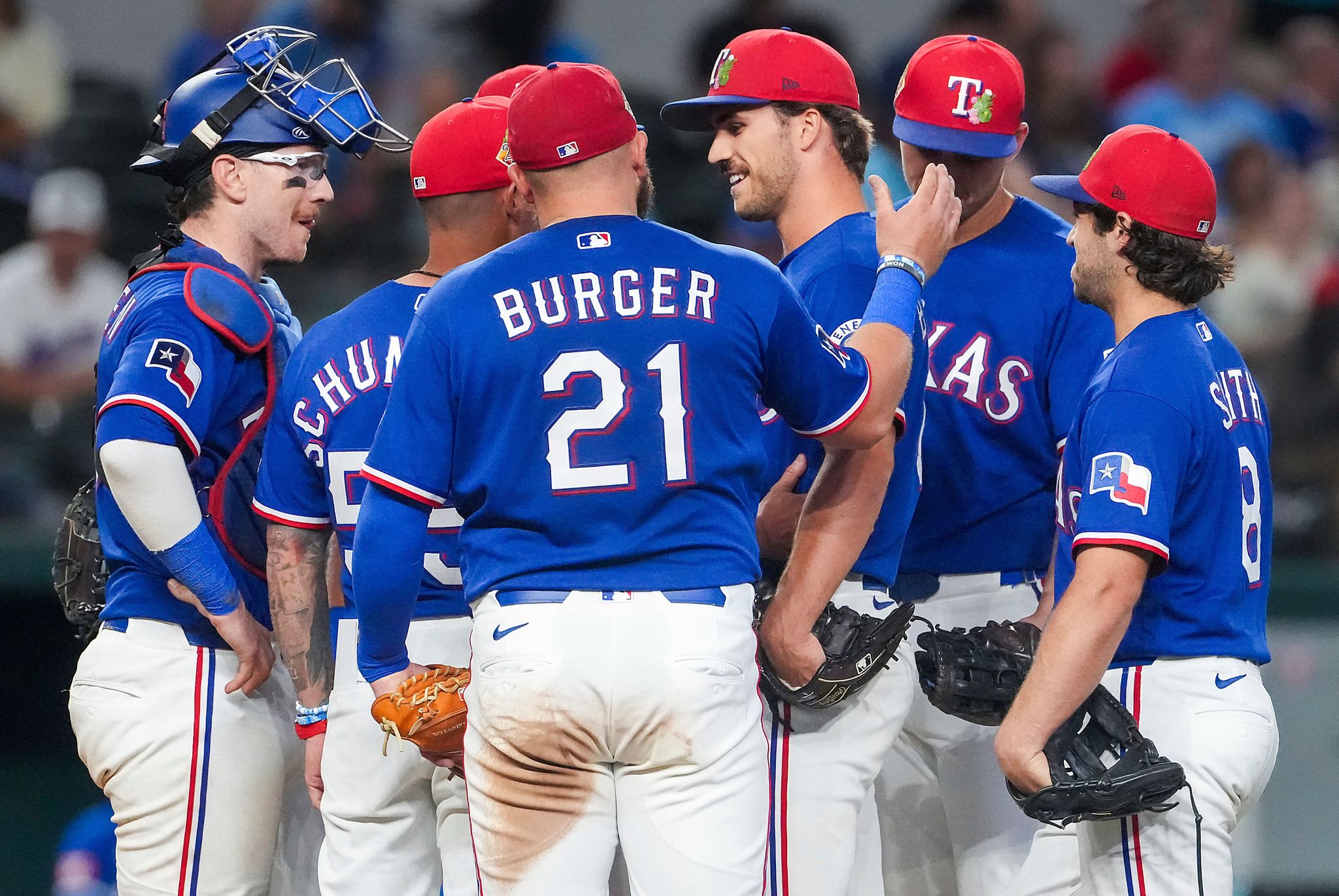 Rangers rookie pitcher finds out he made the team during a mound visit ...