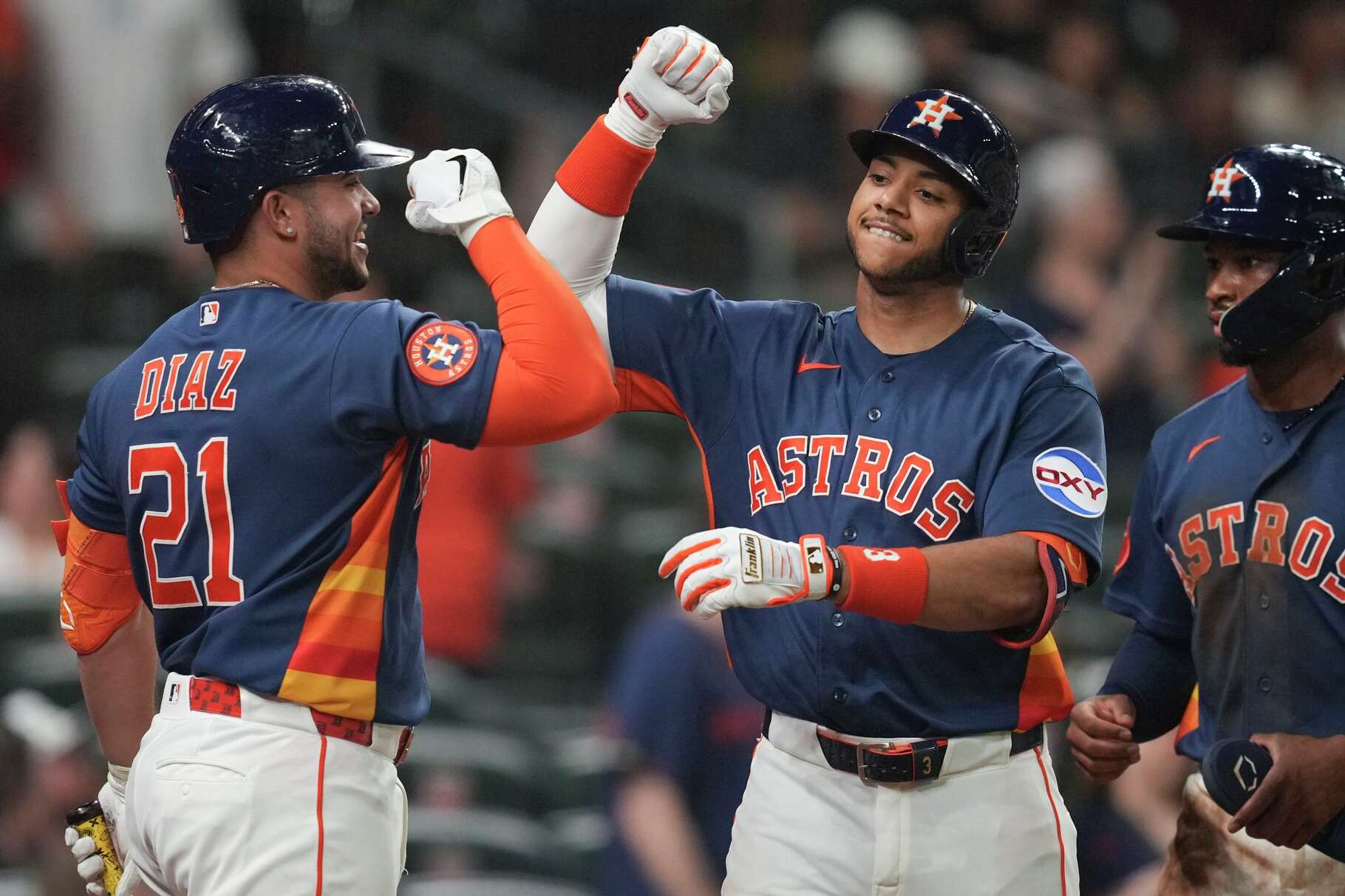 Houston Astros Jeremy Peña, right, celebrates with Yainer Diaz after hitting a 2-run home run during an exhibition game at Daikin Park in Houston, Tuesday, March 24, 2026.