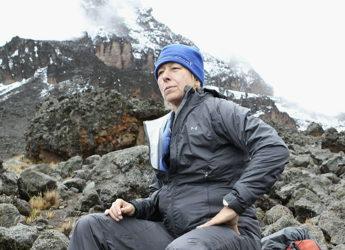 Martina Navratilova takes a break at around 4500m on day four of the Martina Navratilova Mt. Kilimanjaro Climb Day One on Dec. 9 in Arusha, Tanzania. Martina Navratilova and her team are climbing Mount Kilimanjaro to raise money for the Laureus Sport for Good Foundation. Martina Navratilova, a member of the Laureus World Sports Academy will attempt to scale the 5895m peak, Africa's highest free standing mountain with a team of fundraisers including German Paralympic cyclist Michael Teuber and British badminton player Gail Emms . (Photo by Chris Jackson/Getty Images for Laureus)