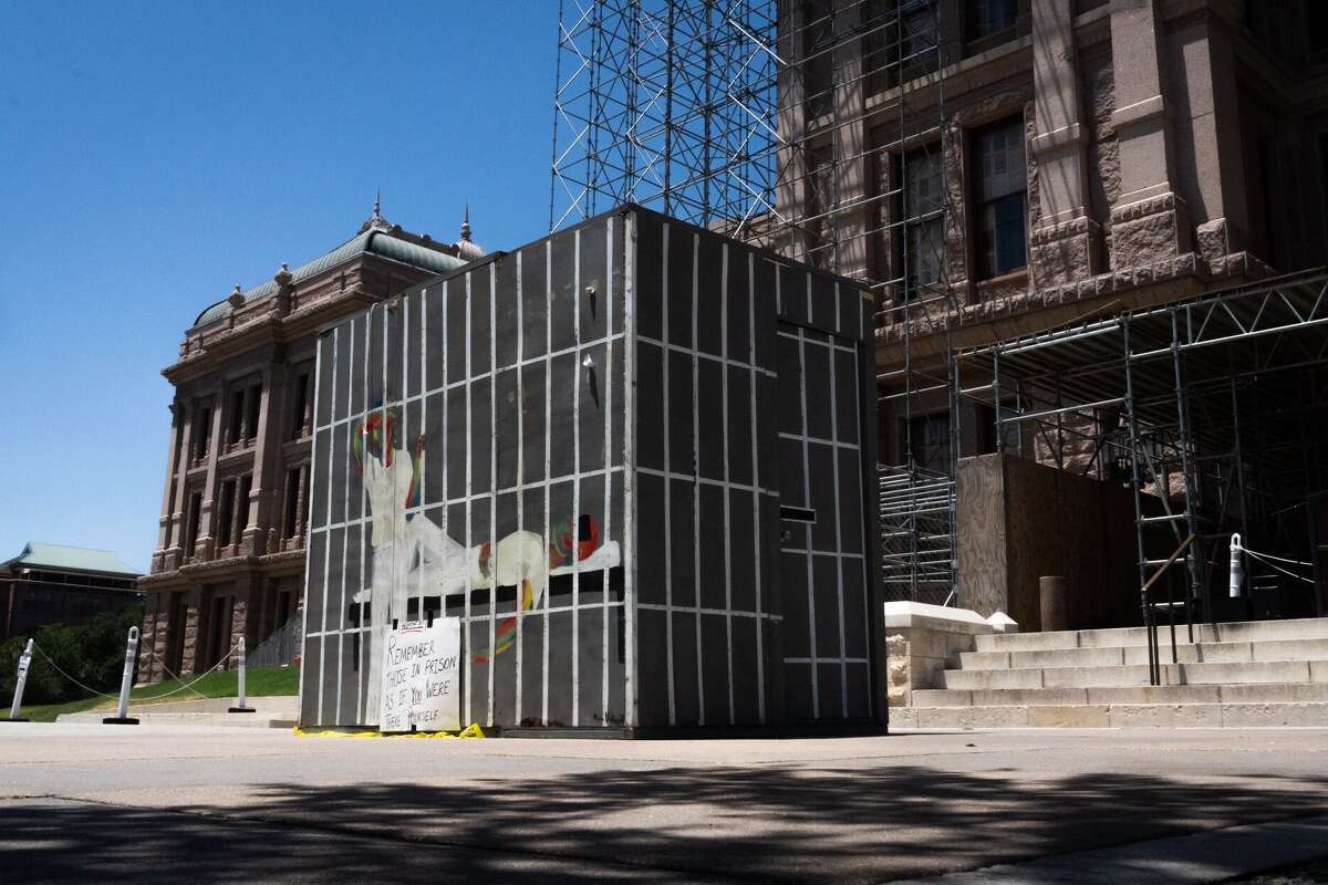 A mock prison cell was set up near the south steps of the Capitol in July 2023 as part of a campaign by Texas Prisons Community Advocates to raise awareness about the lack of air conditioning in Texas prisons.