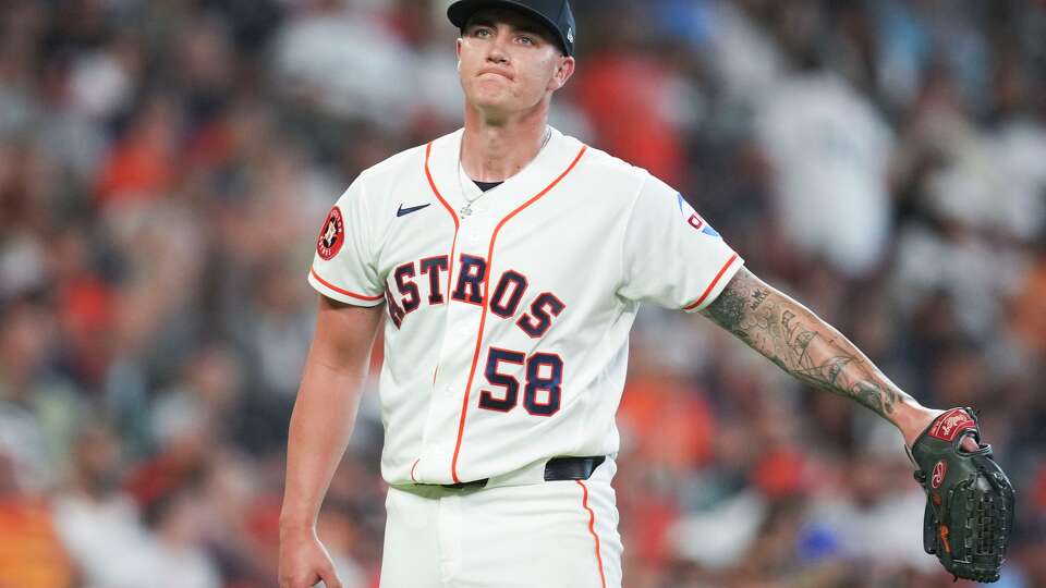 Houston Astros starting pitcher Hunter Brown (58) reacts after walking Los Angeles Angels Mike Trout during the third inning of a MLB baseball game on Opening Day at Daikin Park, Thursday, March 26, 2026, in Houston.