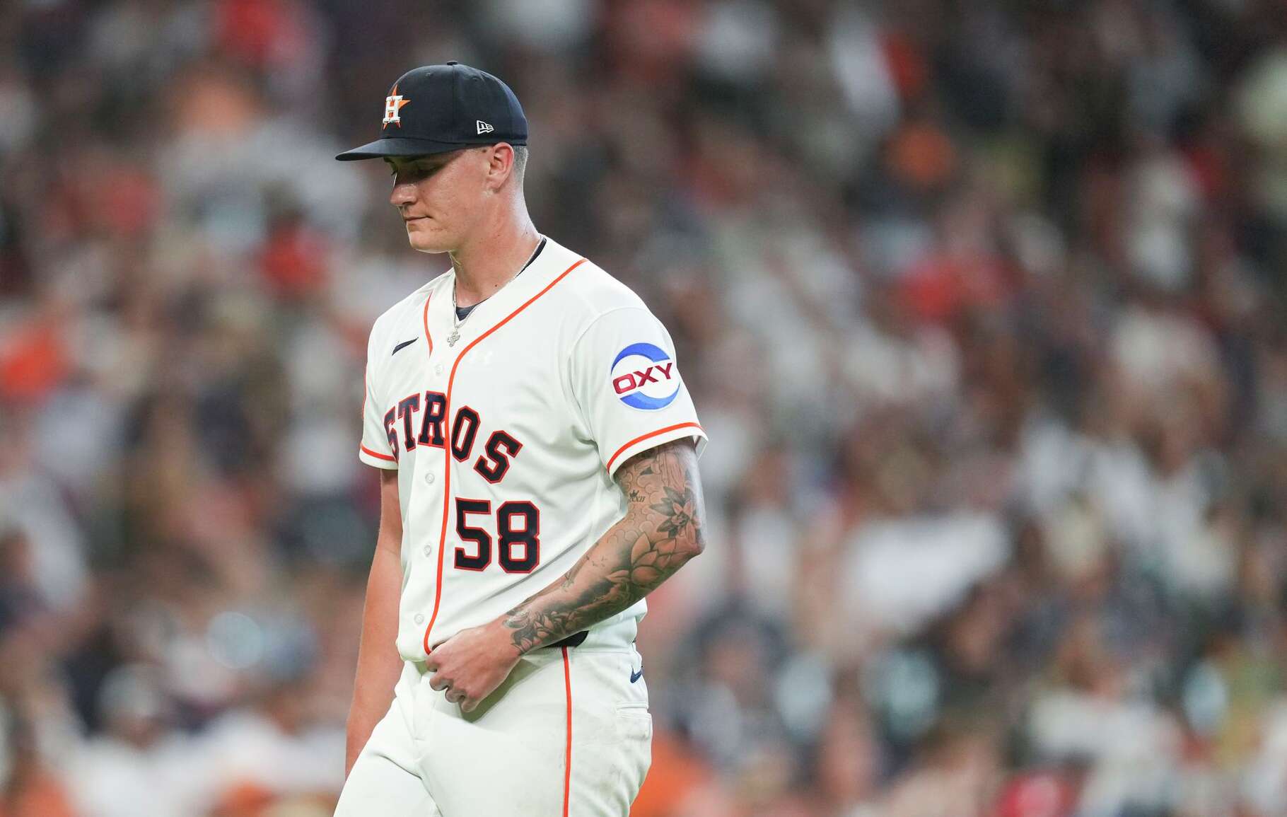 Houston Astros starting pitcher Hunter Brown (58) walks to the dugout after being pulled during the fifth inning of a MLB baseball game on Opening Day at Daikin Park, Thursday, March 26, 2026, in Houston.