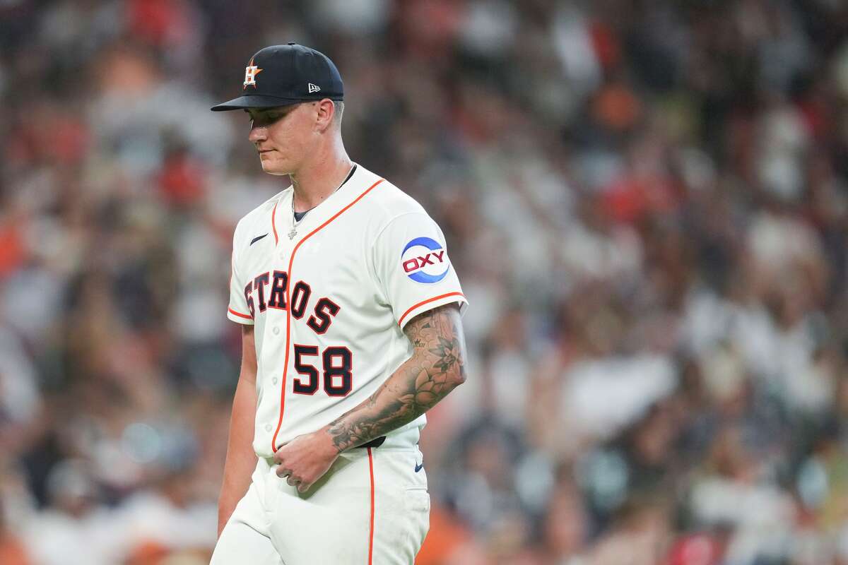 Houston Astros starting pitcher Hunter Brown (58) walks to the dugout after being pulled during the fifth inning of a MLB baseball game on Opening Day at Daikin Park, Thursday, March 26, 2026, in Houston.