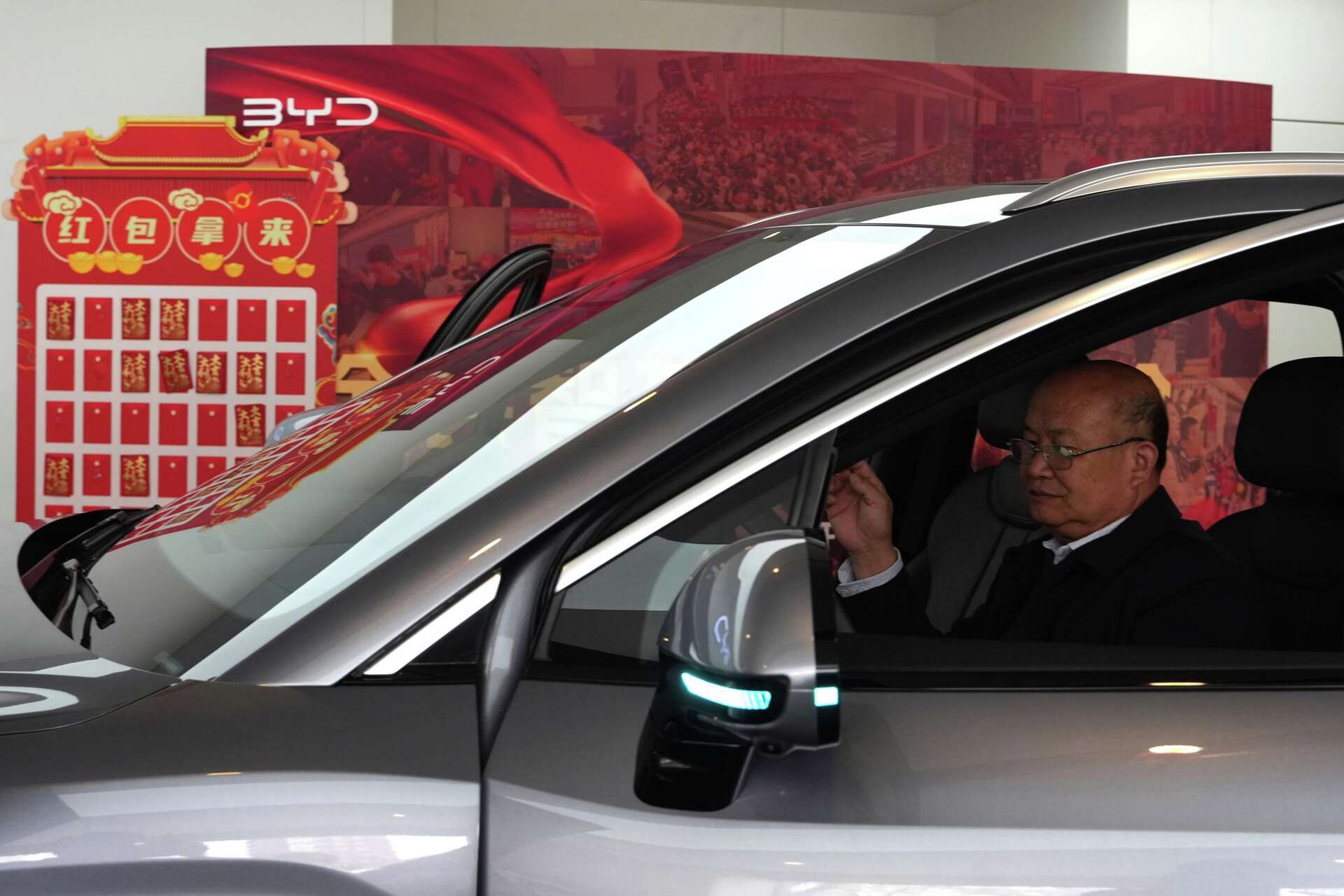 China's BYD sees first profit drop since 2021, even as the Tesla-rival ...