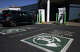 A driver prepares to charge his electric car at a charging station in Corte Madera in September 2020.