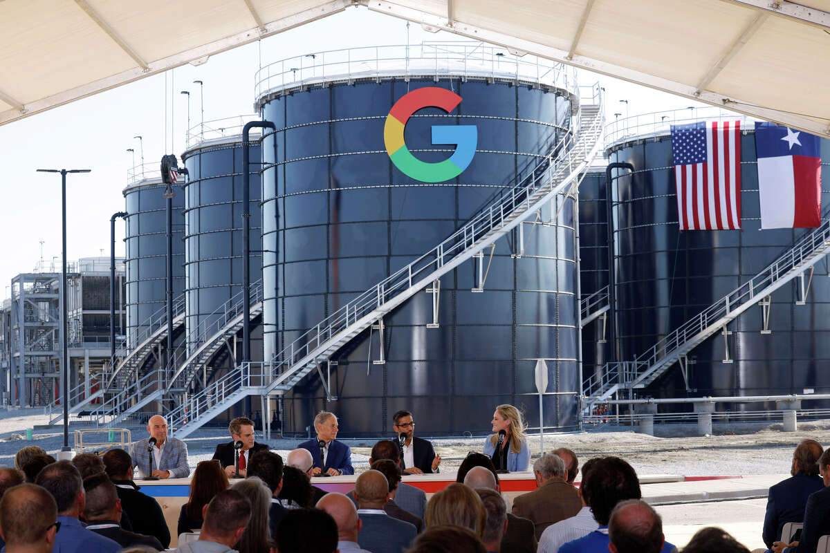 Alphabet and Google CEO Sundar Pichai, second from right, speaks during a news conference to announce Google's $40 billion investment in Texas on Friday, Nov. 14, 2025, in Midlothian. U.S. Rep. Jake Ellzey, from left, U.S. Deputy Secretary of Energy James Danly, Gov. Greg Abbott, and Amanda Peterson Corio, global head of data center energy at Google, listen.