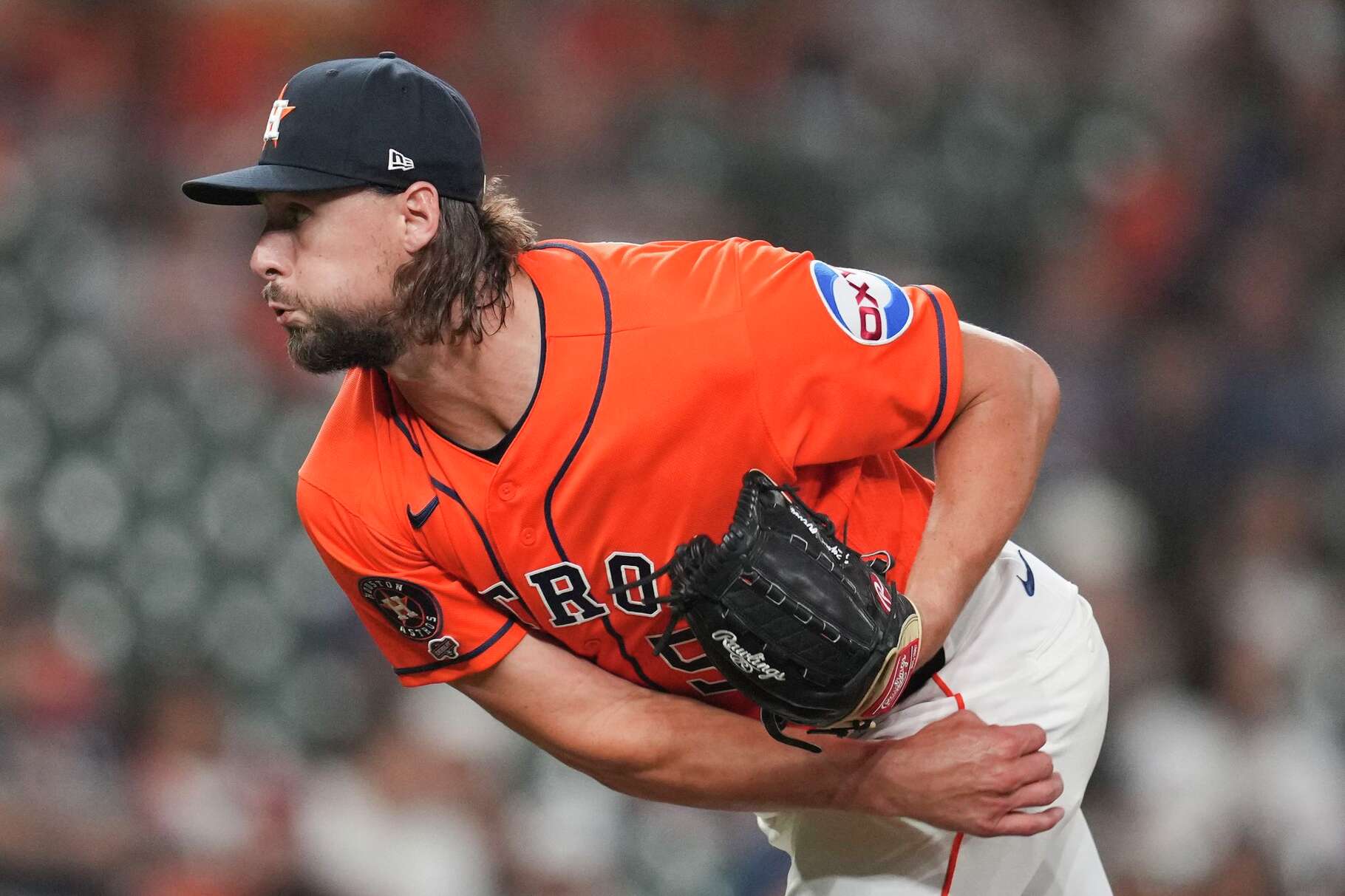 Houston Astros pitcher Ryan Weiss (51) delivers during the ninth inning of a MLB baseball game at Daikin Park, Friday, March 27, 2026, in Houston.