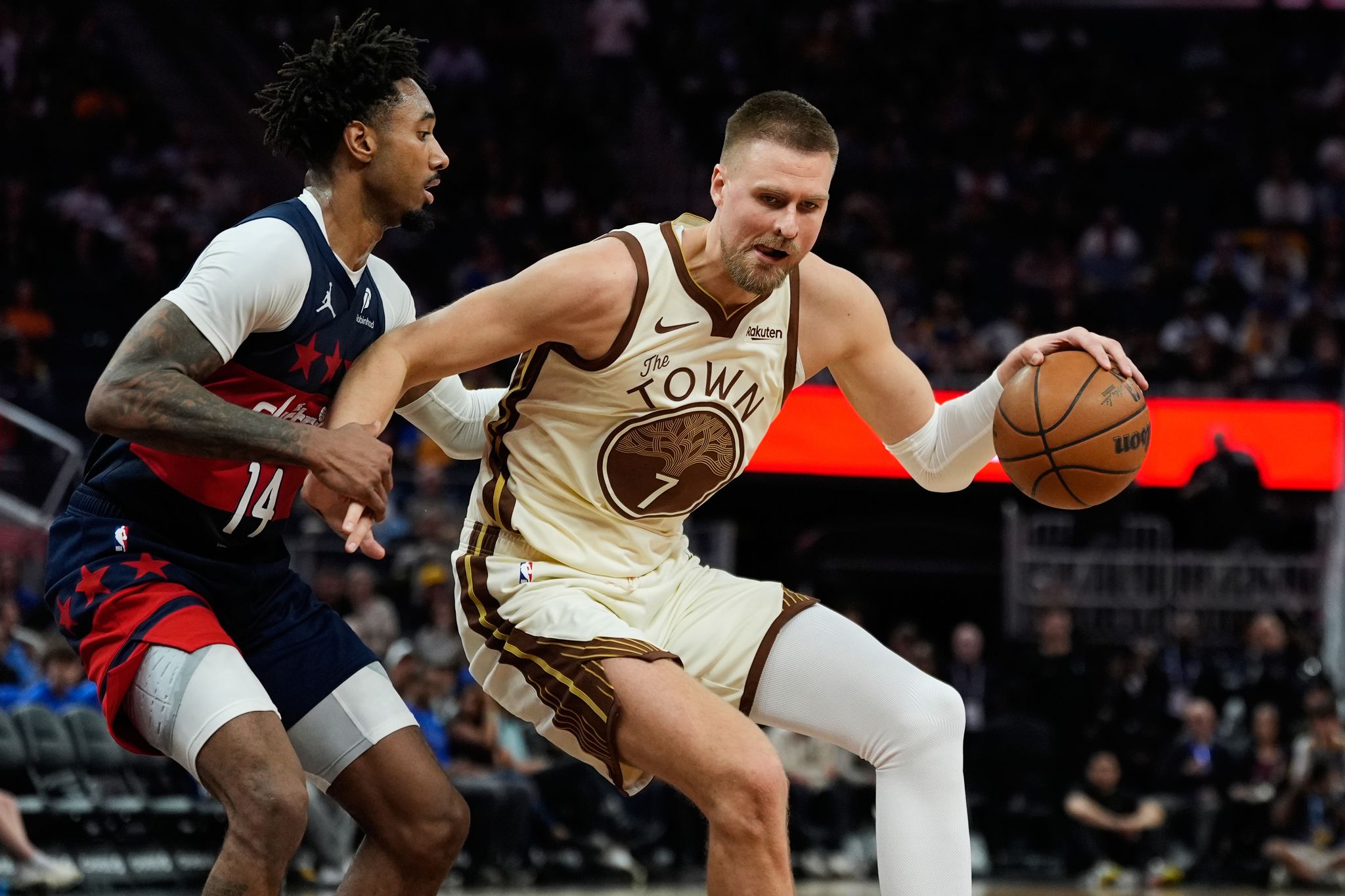 Kristaps Porzingis attacking the basket for Golden State during a 2026 game